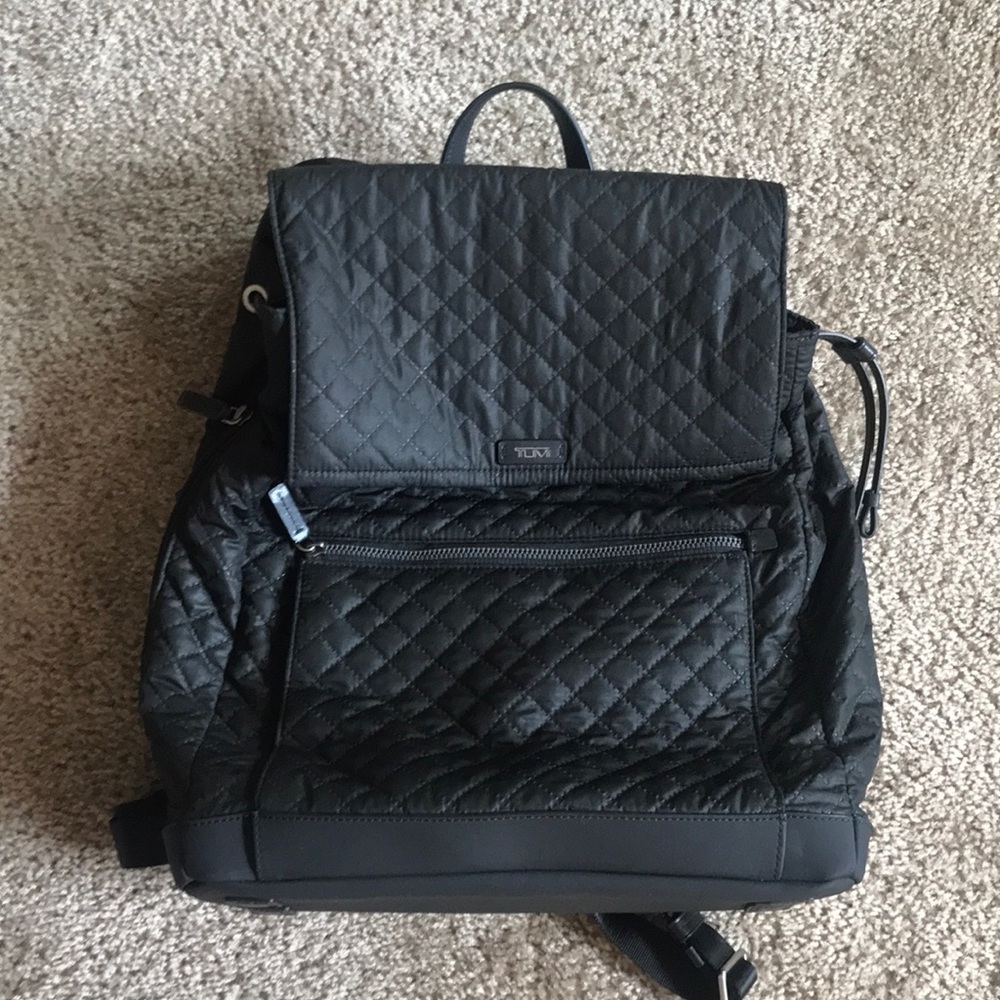TUMI backpack as is pristine